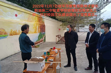  乐玩(中国)美术教师到油麻二中绘制艺术墙活动